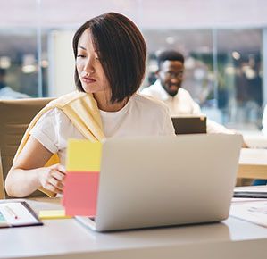 Female Asian Professional Reviewing Standards